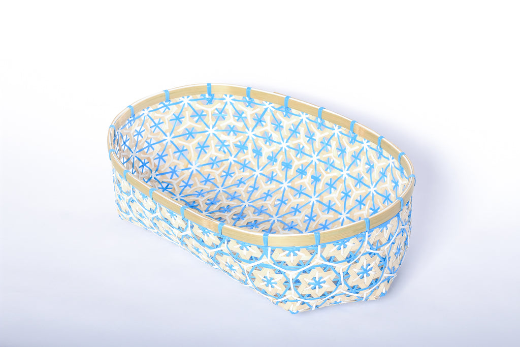 Blue Faustina Festive Star Bread and Fruit Basket made from 100% natural plant fiber, featuring a celestial star motif. Perfect for organizing bread, fruits, and essentials while adding a decorative touch to your home. Sustainable design for eco-friendly living.