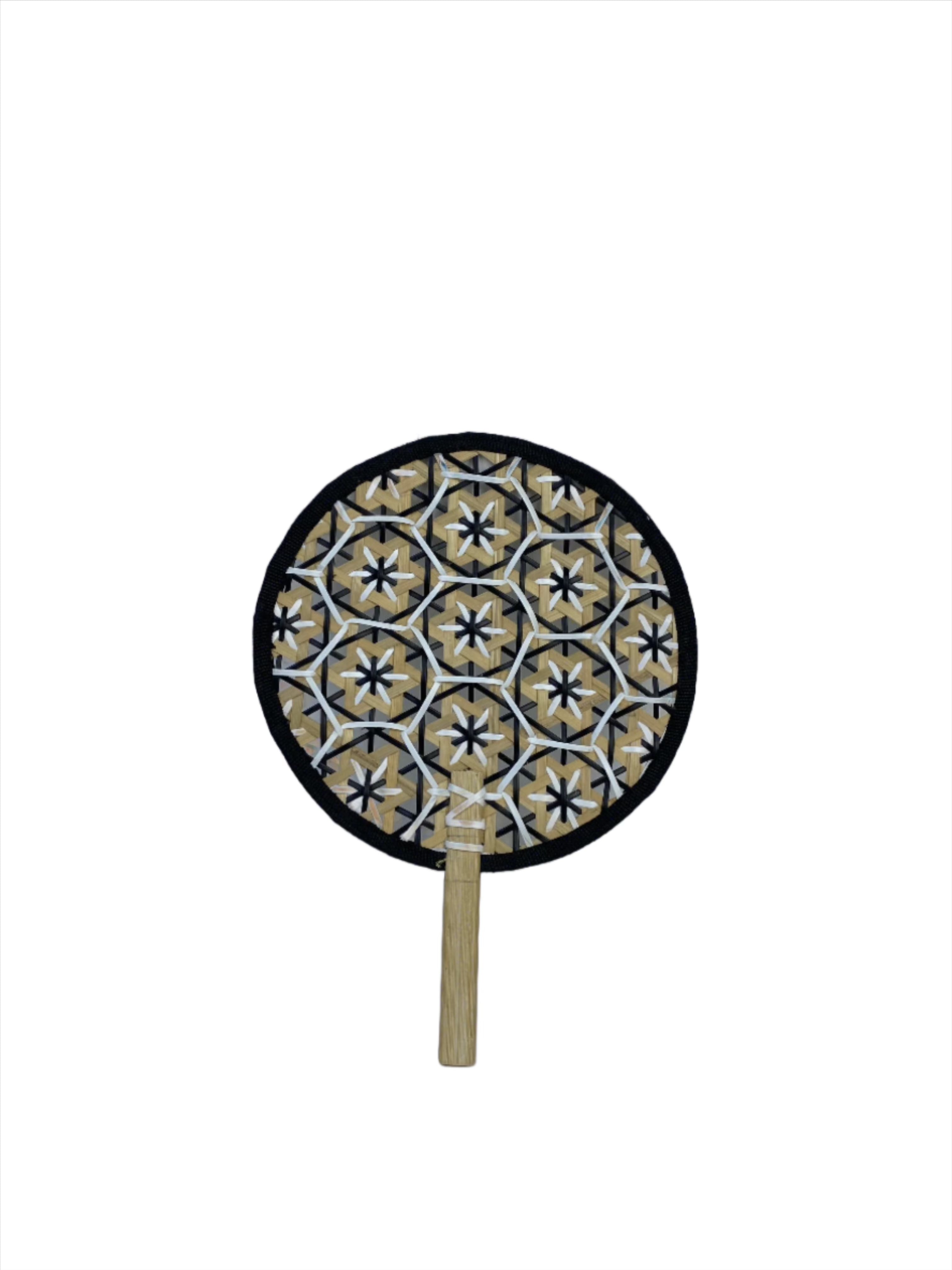 Faustina Black Festive Woven Hand Fan made from eco-friendly materials, featuring a vibrant design perfect for weddings and parties. This lightweight and practical fan provides a refreshing breeze while supporting sustainability, making it an ideal accessory for celebrations.