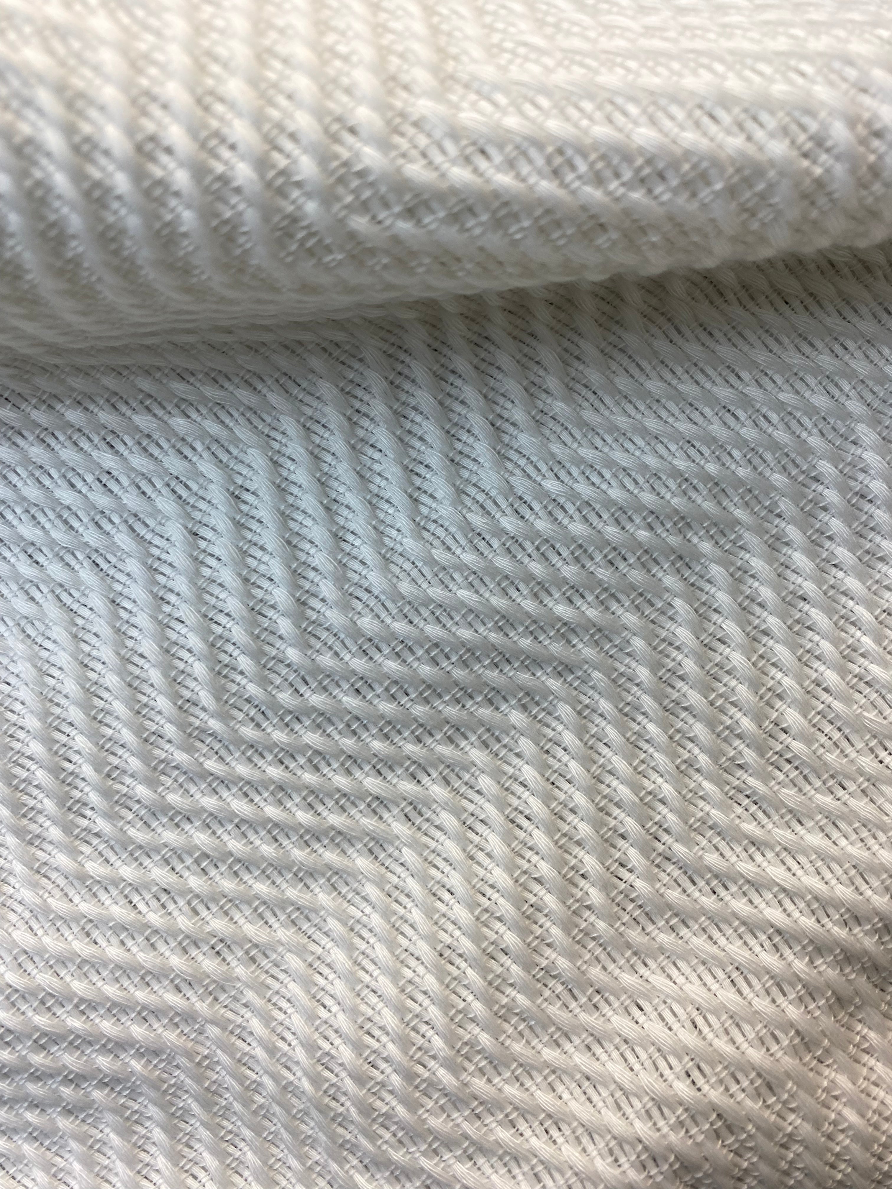 Embrace tradition with the Percy Woven Blanket from La Union. Handcrafted by skilled artisans using sustainable practices, this eco-friendly blanket brings warmth, texture, and cultural heritage to your home decor.