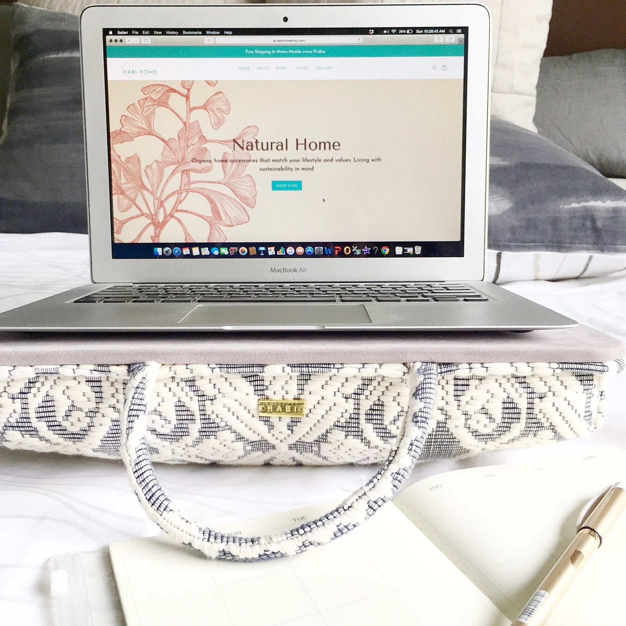 Handwoven Hazel Laptop Pillow made from Abel Iloco fabric, featuring geometric patterns inspired by nature, offering comfort and cultural heritage with a soft, durable design perfect for home or office use.