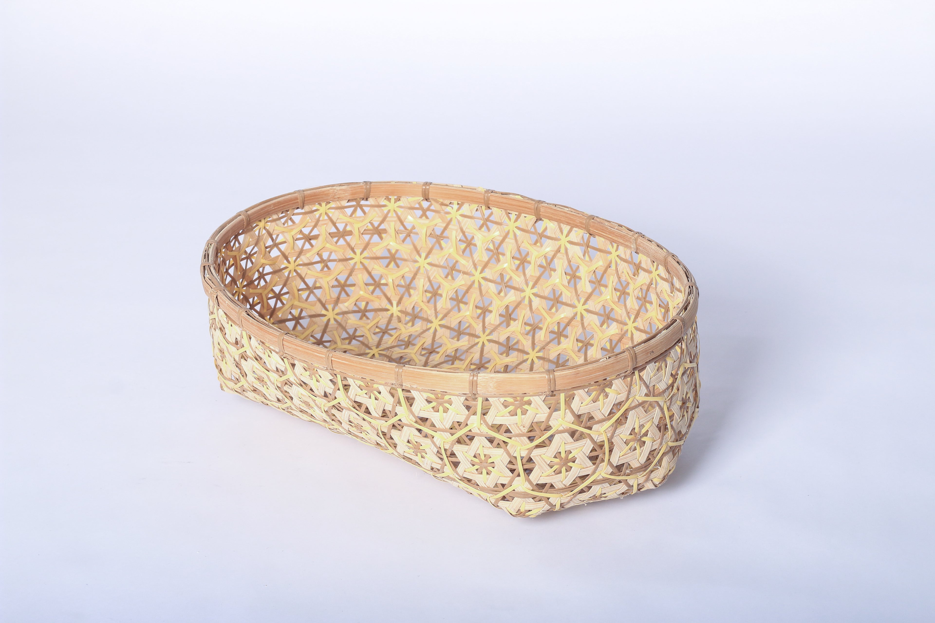 Nude Faustina Festive Star Bread and Fruit Basket made from 100% natural plant fiber, featuring a celestial star motif. Perfect for organizing bread, fruits, and essentials while adding a decorative touch to your home. Sustainable design for eco-friendly living.