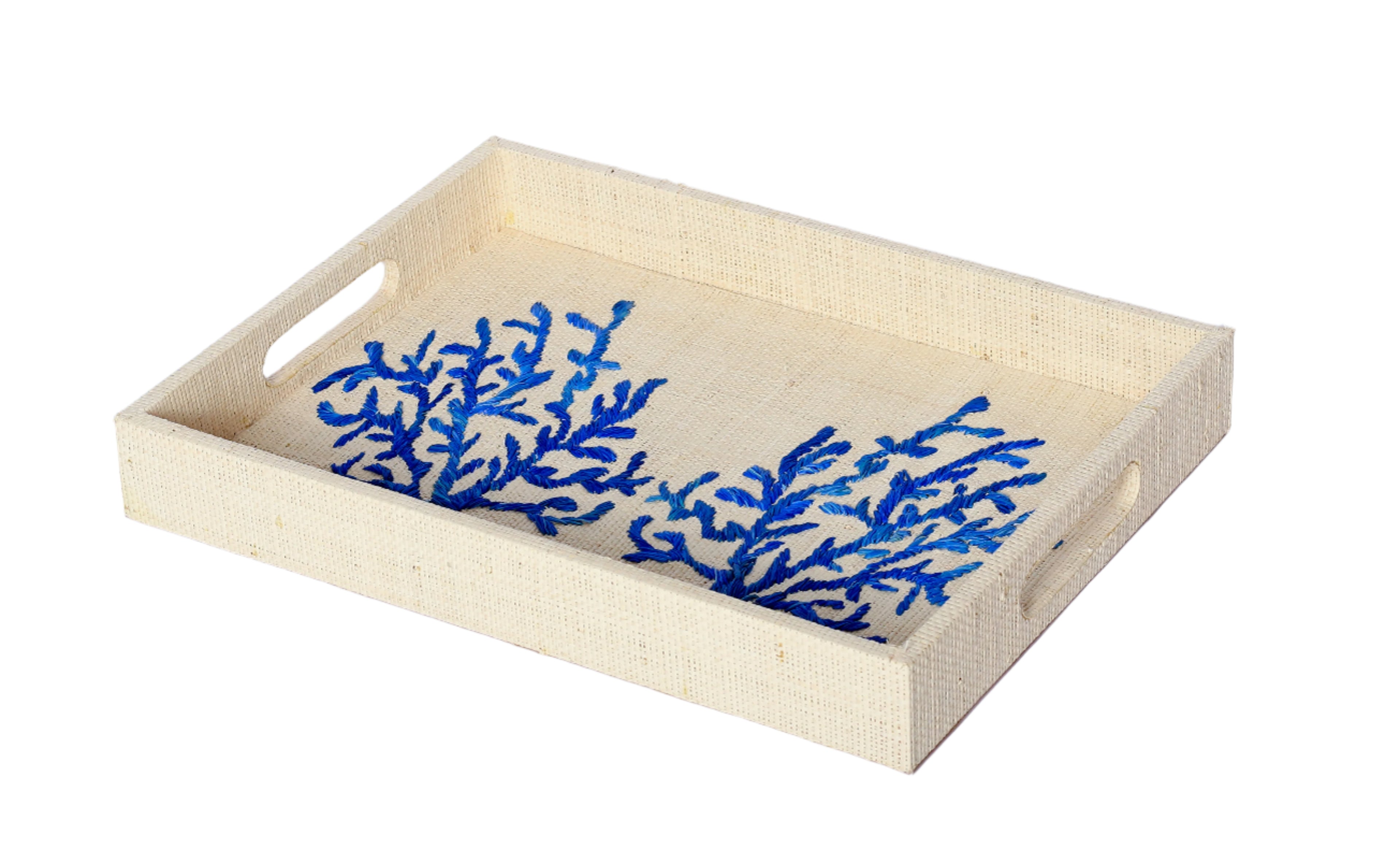Elevate your home decor with Penelope Coral Blue Embroidered Trays made from eco-friendly raffia. Featuring elegant embroidery, these versatile trays serve as both functional and stylish accents for organizing or serving.