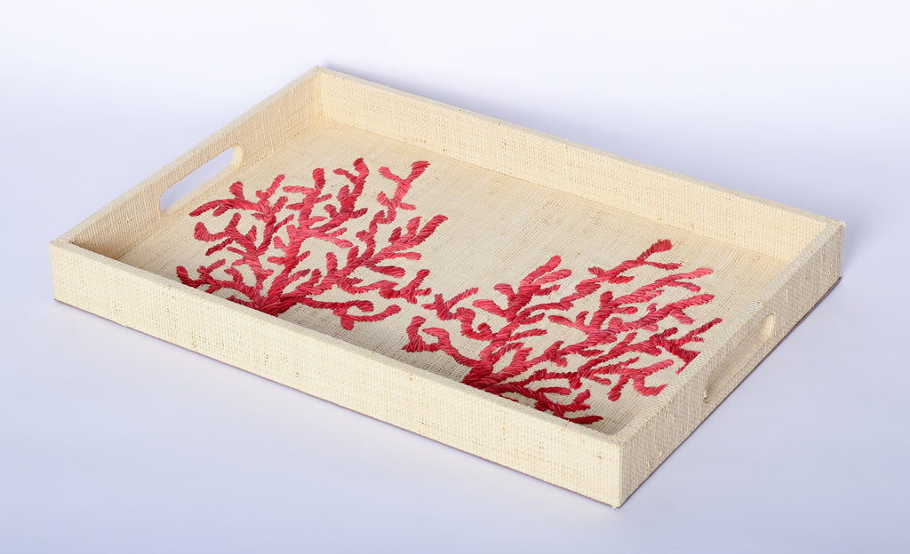 Elevate your home decor with Penelope Coral Red Embroidered Trays made from eco-friendly raffia. Featuring elegant embroidery, these versatile trays serve as both functional and stylish accents for organizing or serving.
