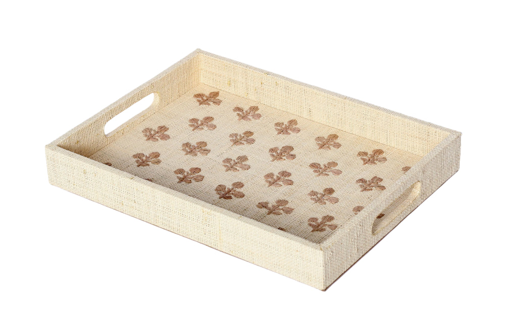 Elevate your home decor with Penelope Fleur de Lys Embroidered Trays made from eco-friendly raffia. Featuring elegant embroidery, these versatile trays serve as both functional and stylish accents for organizing or serving.