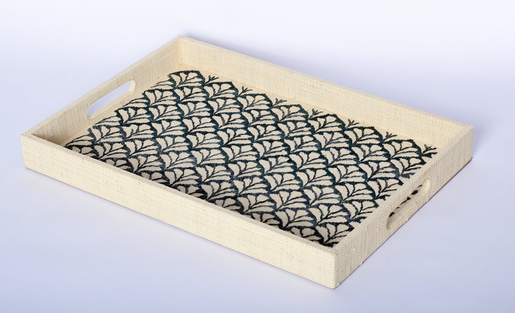 Elevate your home decor with Penelope Floral Embroidered Trays made from eco-friendly raffia. Featuring elegant embroidery, these versatile trays serve as both functional and stylish accents for organizing or serving.