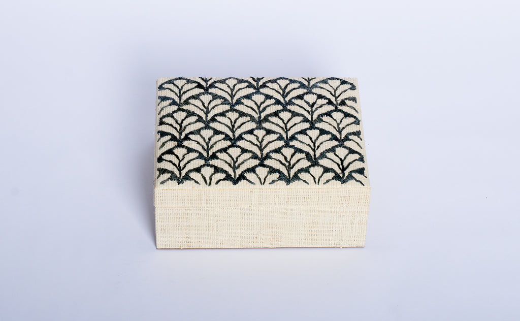 Store your jewelry in style with the Penelope Floral Embroidery Jewelry Box. Made from eco-friendly materials and featuring intricate embroidery, this sustainable box combines function and elegance for your vanity or dresser.