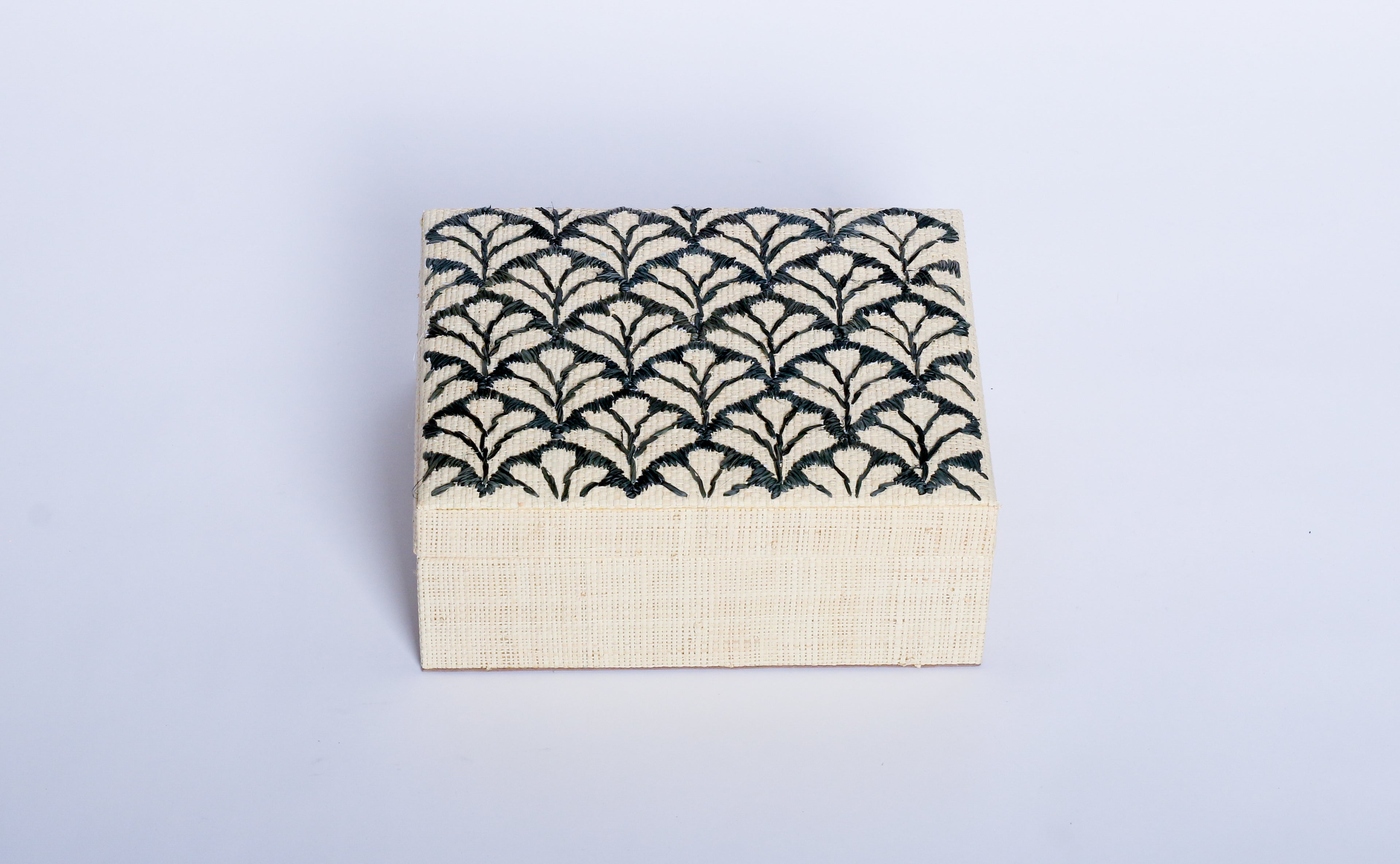 Store your jewelry in style with the Penelope Floral Embroidery Jewelry Box. Made from eco-friendly materials and featuring intricate embroidery, this sustainable box combines function and elegance for your vanity or dresser.