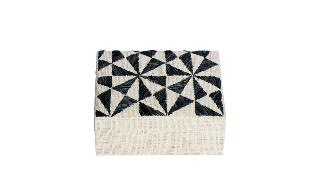 Store your jewelry in style with the Penelope Geometric Triangles Embroidery Jewelry Box. Made from eco-friendly materials and featuring intricate embroidery, this sustainable box combines function and elegance for your vanity or dresser.