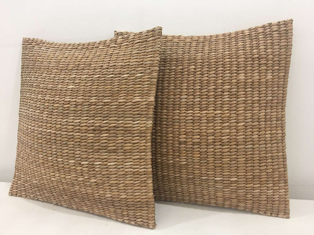 Carol Seagrass Floor Pillow, crafted from 100% natural seagrass, offers eco-friendly comfort and rustic elegance to any living space. This lightweight, beautifully textured floor pillow adapts to various lifestyles, whether placed on a rattan bench or used for casual lounging on the floor. Its earthy tones complement multiple decor styles, including bohemian and coastal, making it a stunning accent piece that sparks conversations among guests. Care instructions recommend avoiding prolonged moisture exposure