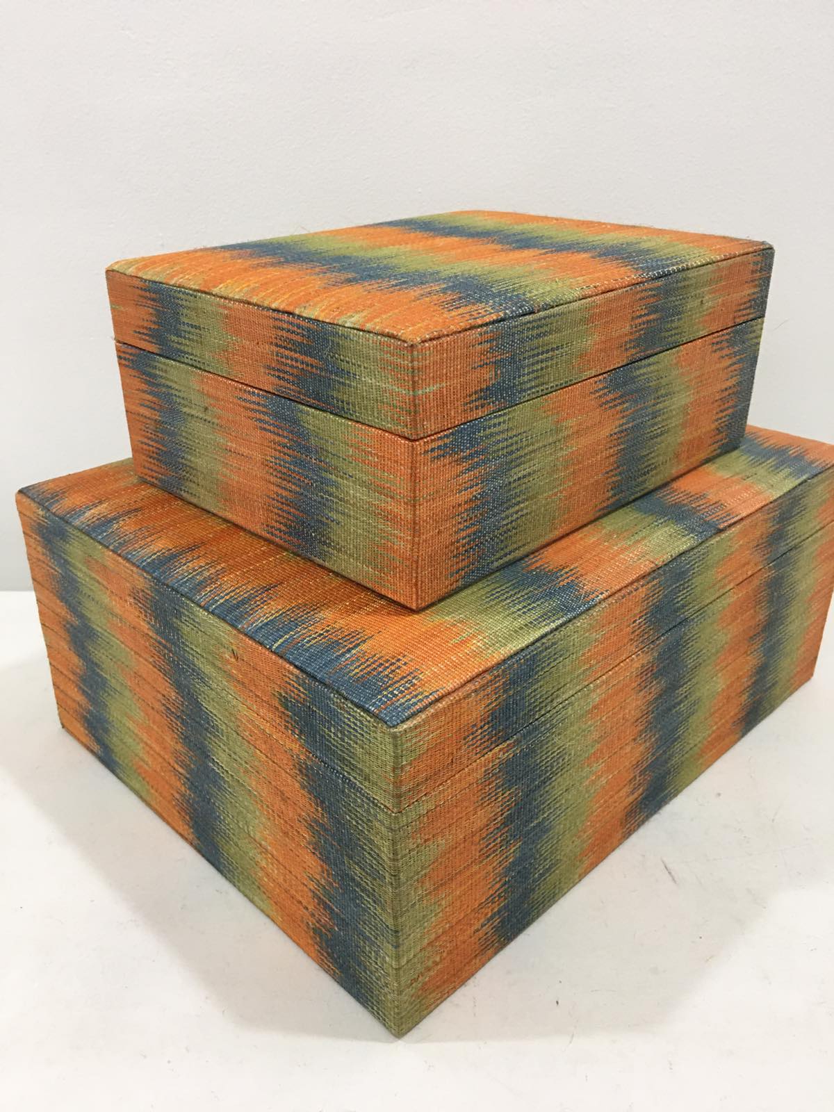 Chloe Storage Boxes Set of 2 in Orange Combi, made from 100% natural plant fiber and T'boli tinalak fabric, perfect for eco-friendly organization.