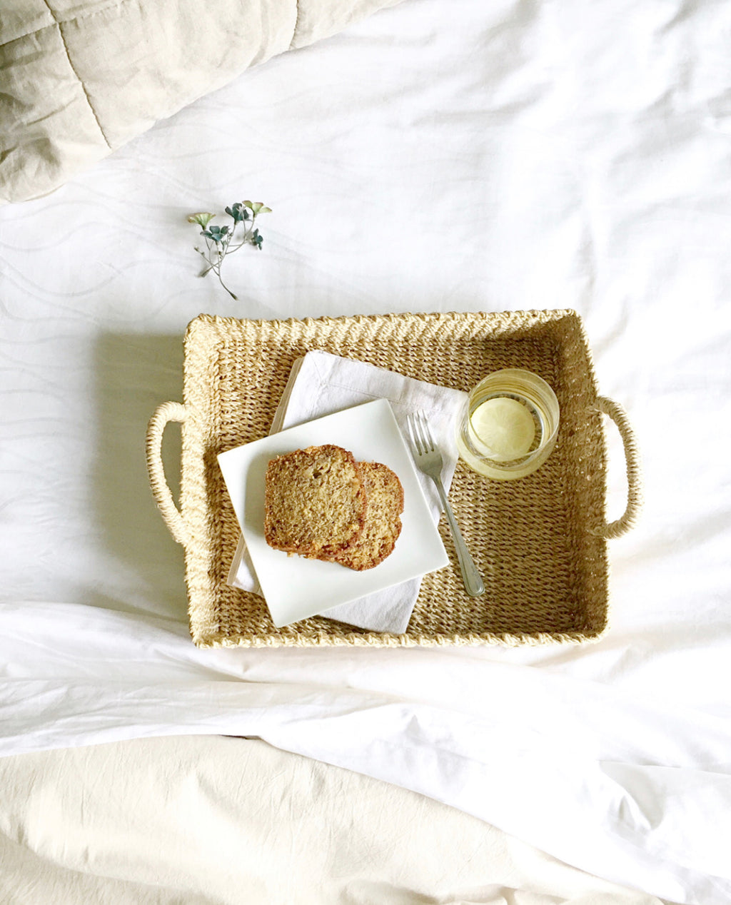 Elevate your home organization with the Stephanie Trays Set of 2. Handwoven from 100% natural plant fiber, these eco-friendly trays offer chic and sustainable storage solutions for any room, enhancing your decor with natural elegance.