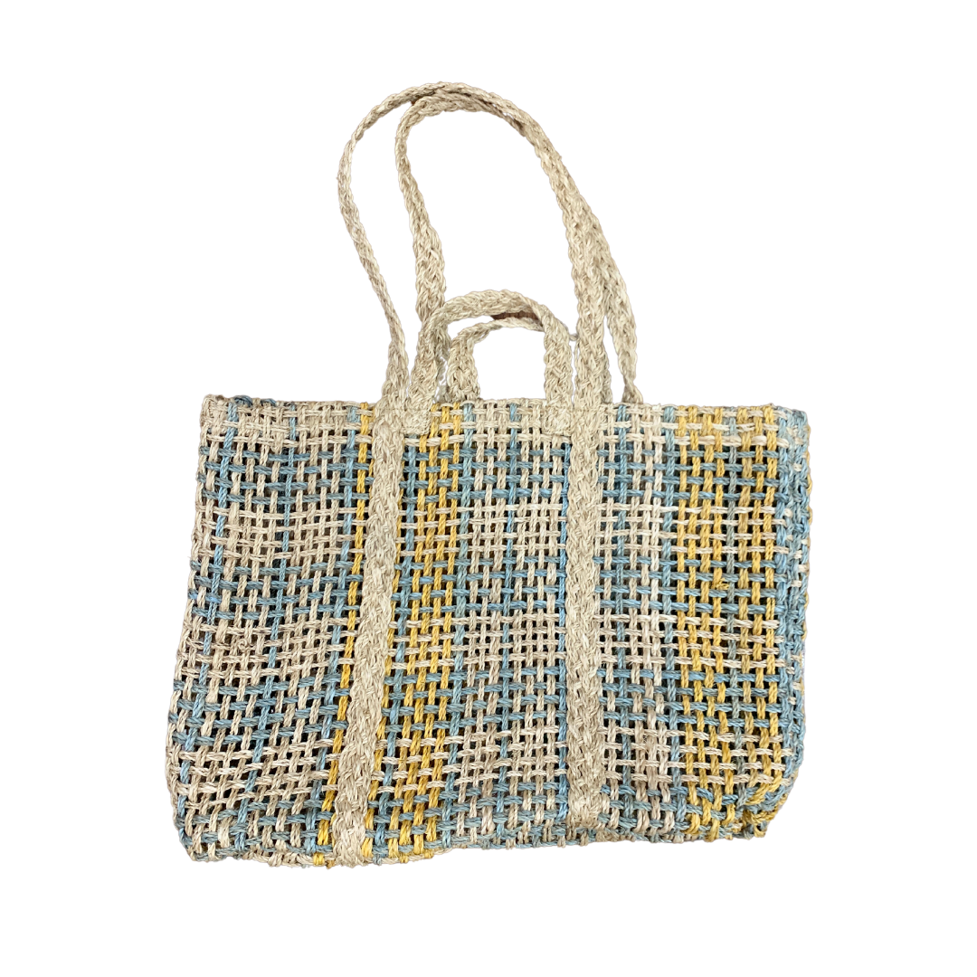 Embrace eco-friendly style with the Tiffany Oversized Yoga Bag, crafted from 100% abaca fiber. This versatile, spacious bag is perfect for yoga, work, or shopping, offering durability and sustainability for your everyday carry.