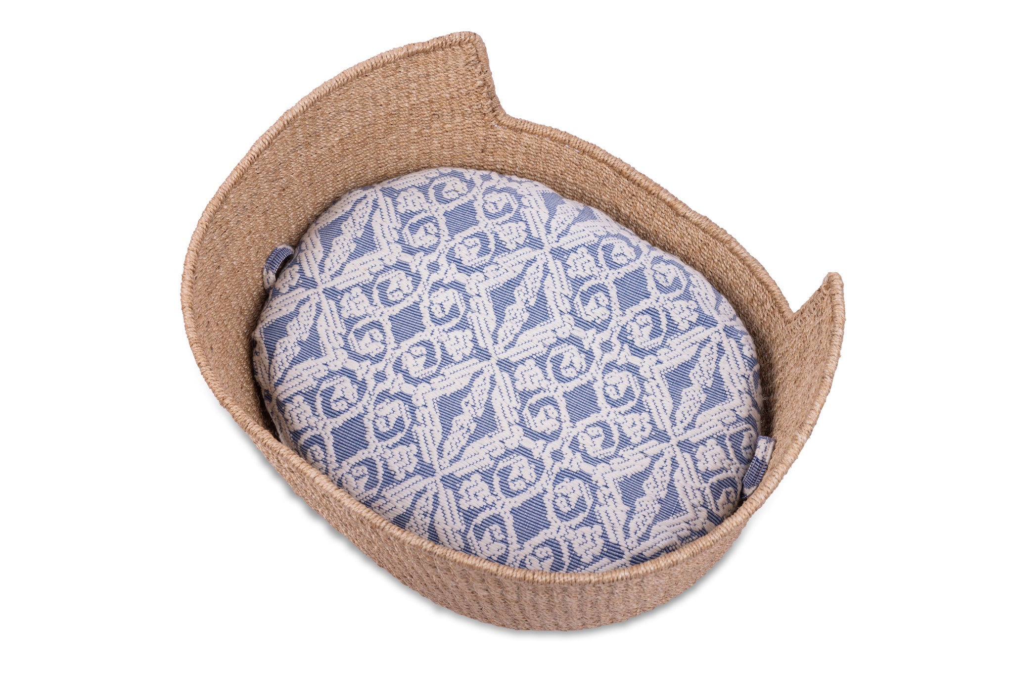Eco-friendly Tippy Pet Bed made from 100% natural plant fiber with a stylish Inabel handwoven fabric cushion. Perfect for small dogs and cats, offering comfort and sophistication for modern Filipino interiors.