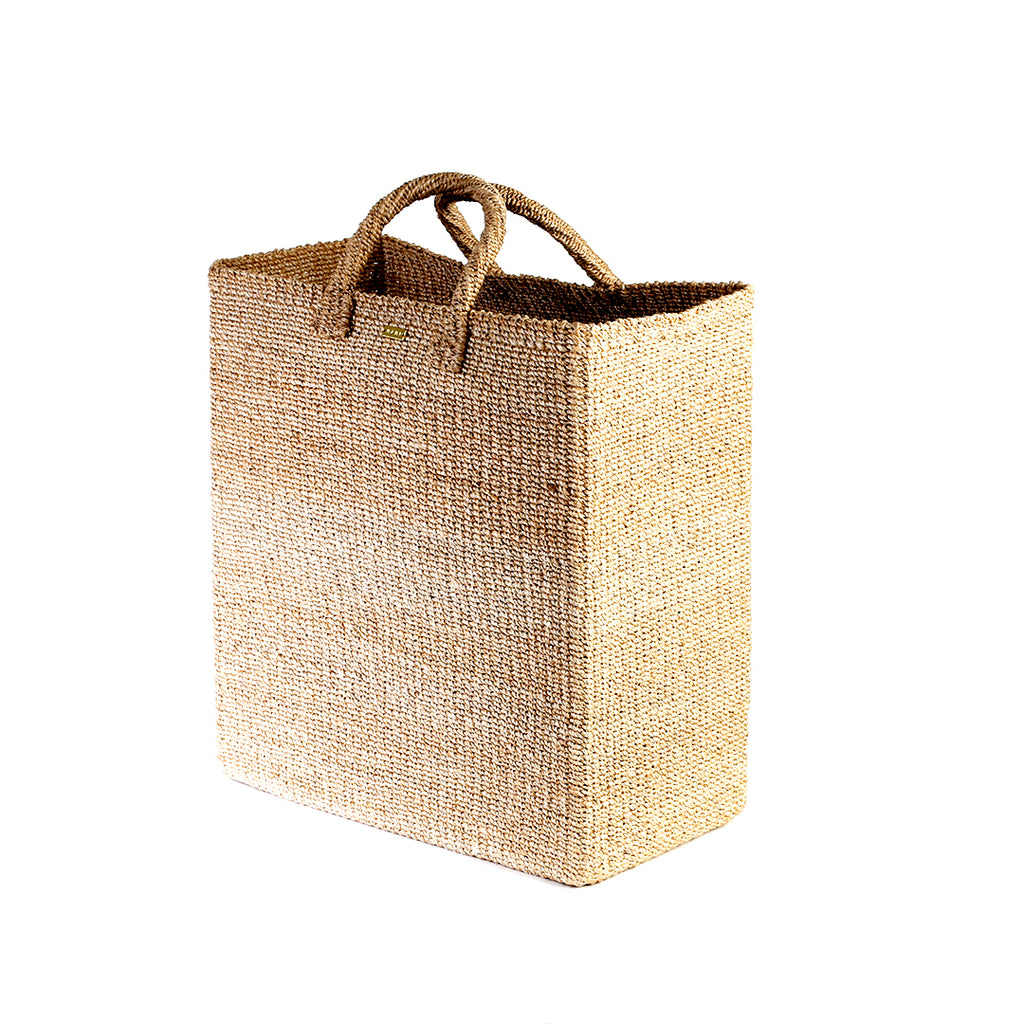 Keep your home organized with the Serene Rectangle Storage Basket. Handwoven from 100% natural plant fiber, this eco-friendly, stylish storage solution is perfect for laundry, sports gear, or seasonal items.