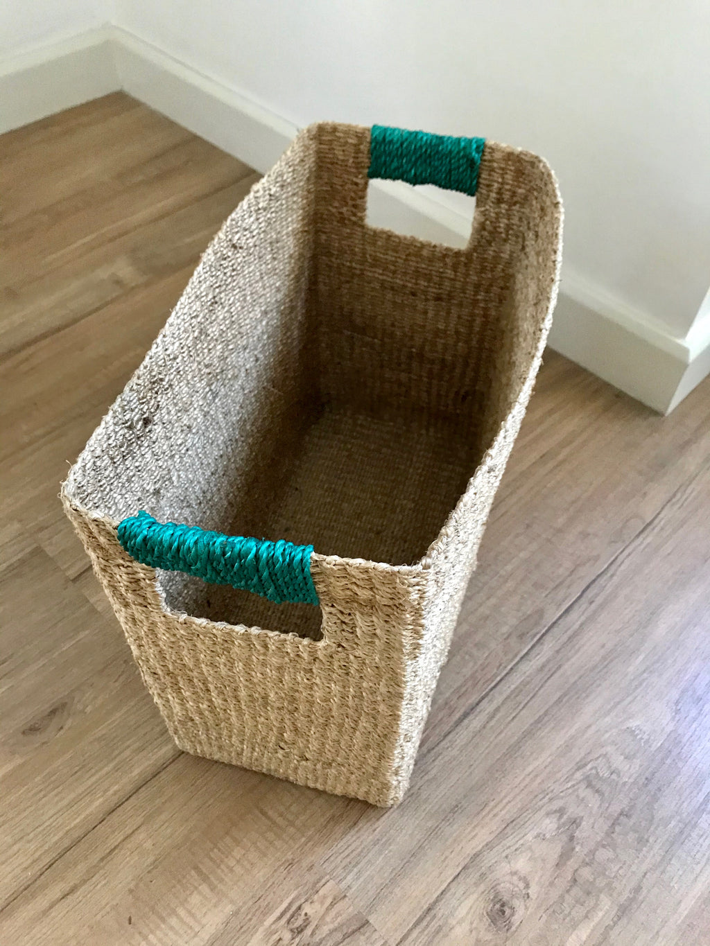 Alex Rectangle Basket from Habi Home Shop - Durable, eco-friendly basket made from 100% natural plant fiber, ideal for organizing homeschool materials, kitchen items, books, toys, and bathroom essentials in a stylish, sustainable way.