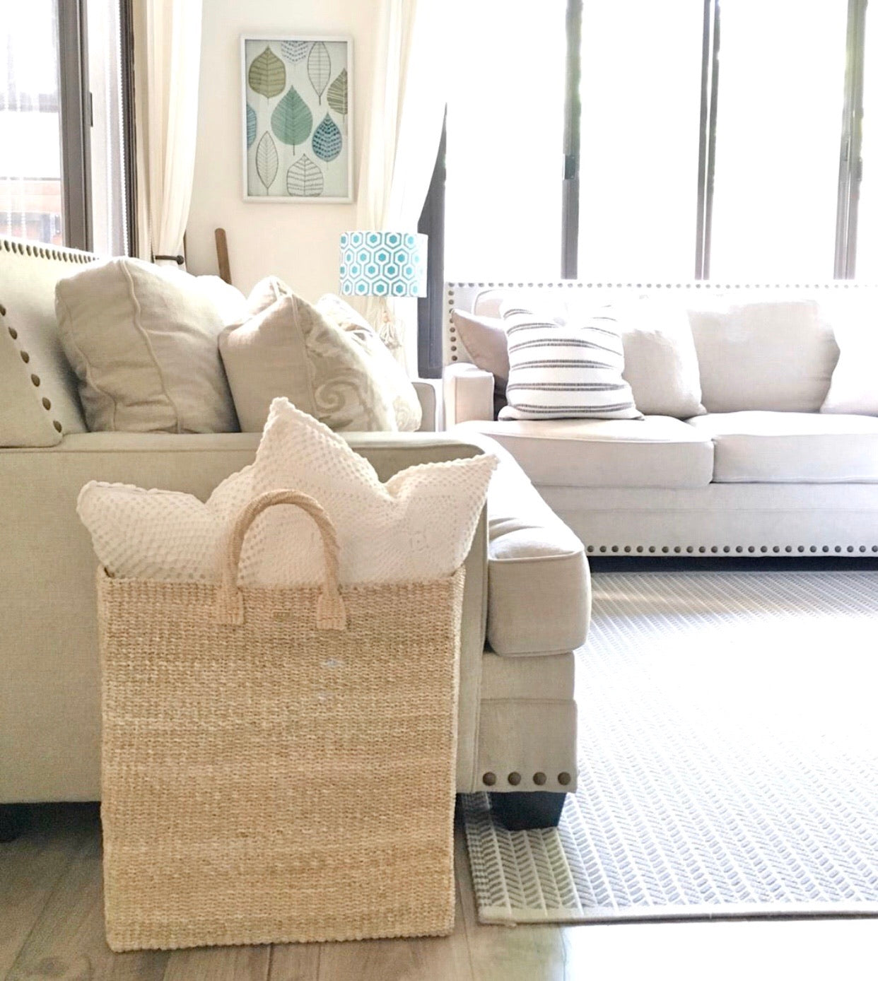 Keep your home organized with the Serene Rectangle Storage Basket. Handwoven from 100% natural plant fiber, this eco-friendly, stylish storage solution is perfect for laundry, sports gear, or seasonal items.